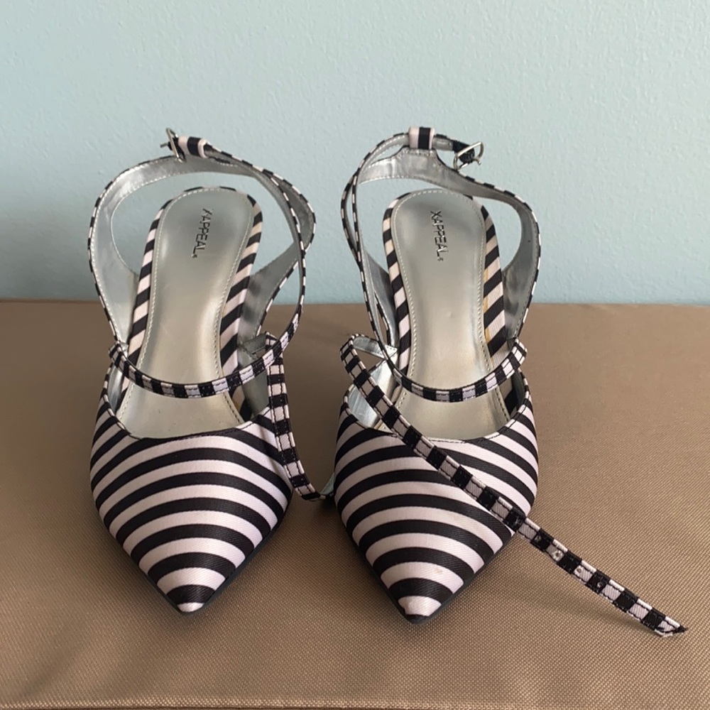 Strappy black and white pumps